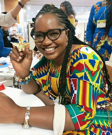 Woman holding a paper crane