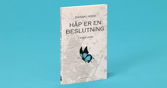 A book cover with Norwegian writing and a blue butterfly on